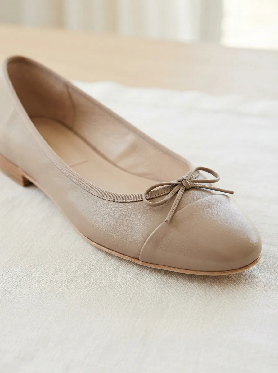 A close-up of the Louise et Cie Leather Ballet Flat, highlighting its soft leather material and sleek design.